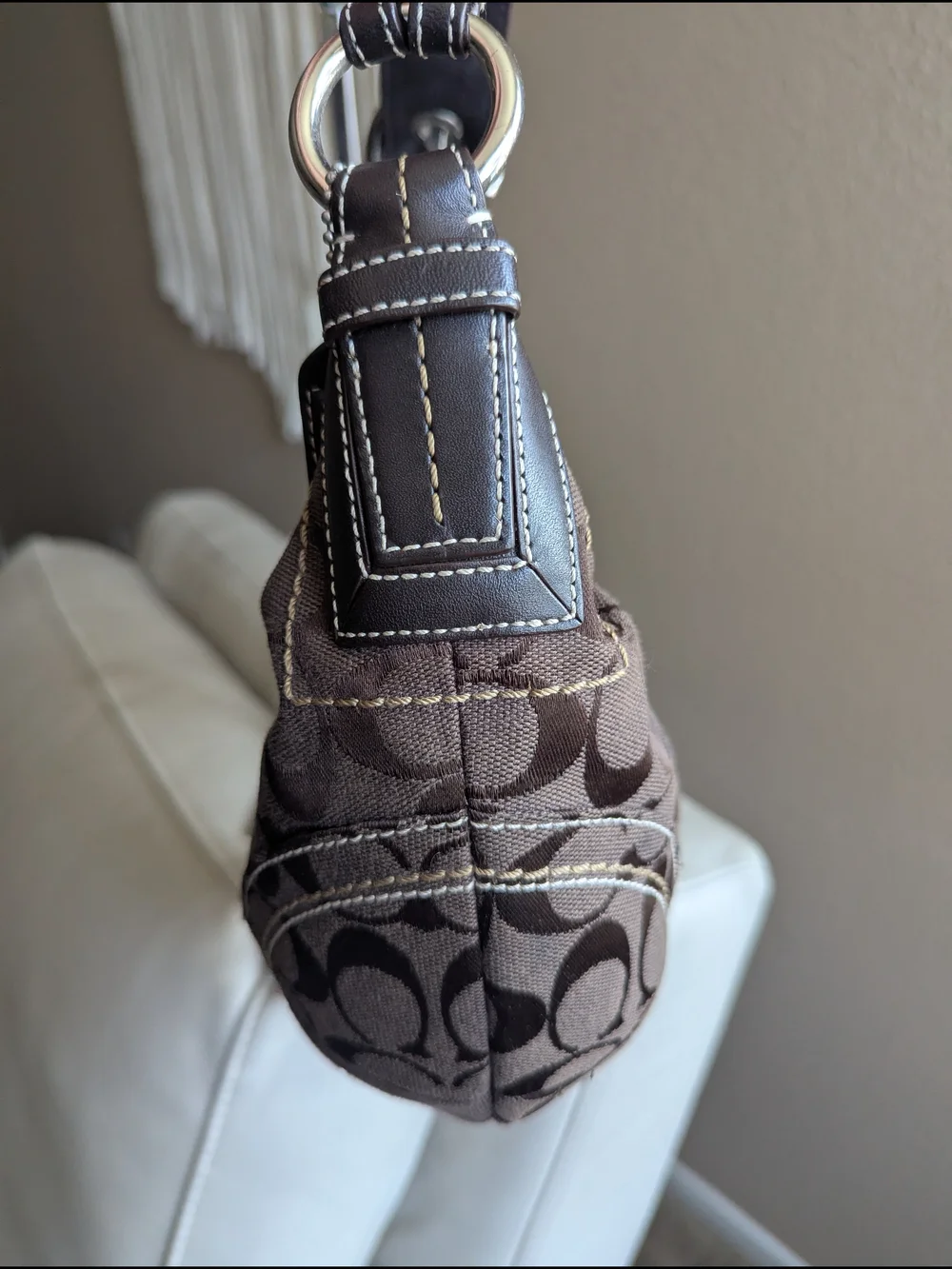 Vintage Coach SohoSignature Canvas HoboShoulder Bag in chocolate brown.
